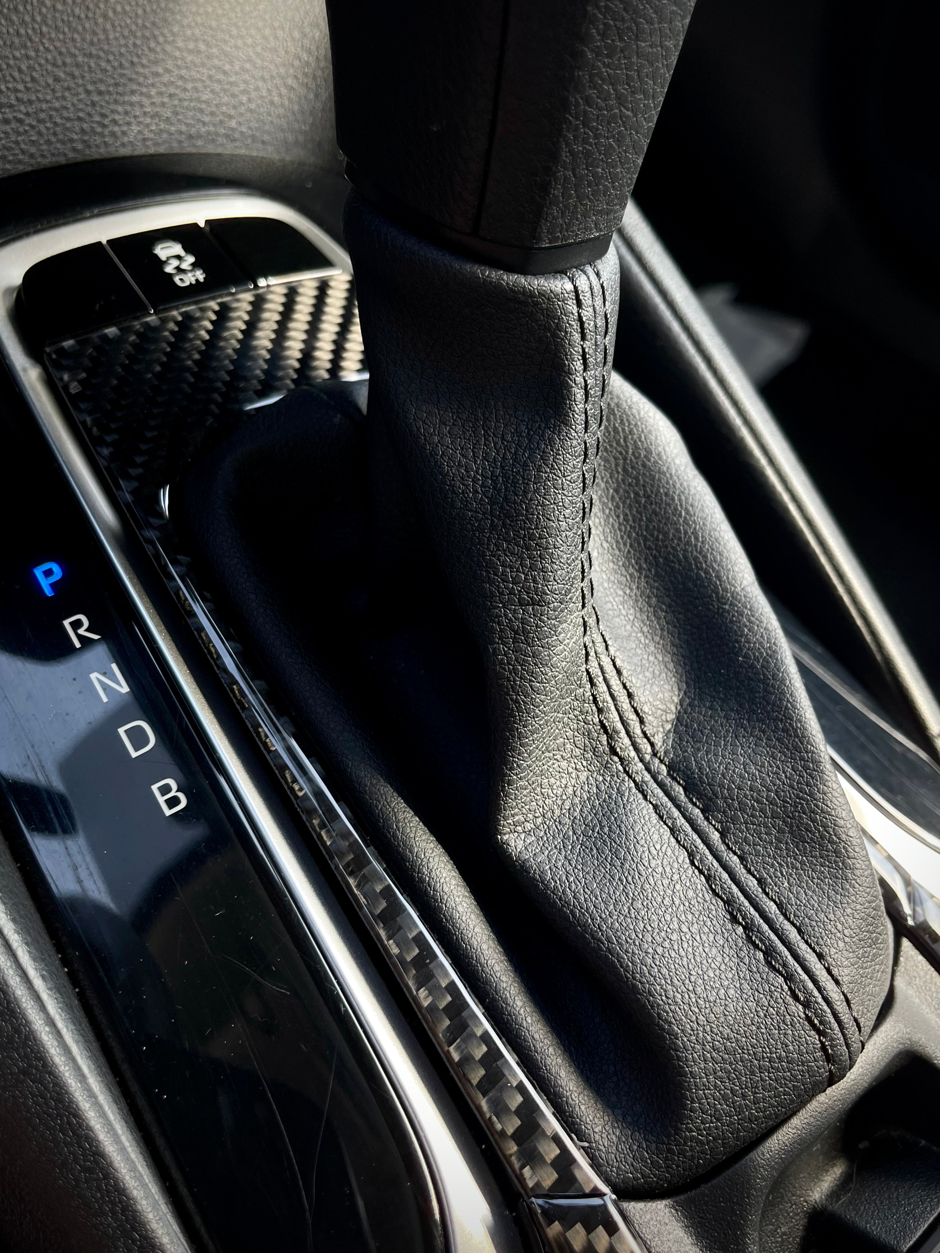 Synth Carbon 2018+ Corolla Hatchback Carbon Fiber Gear Shift Overlay