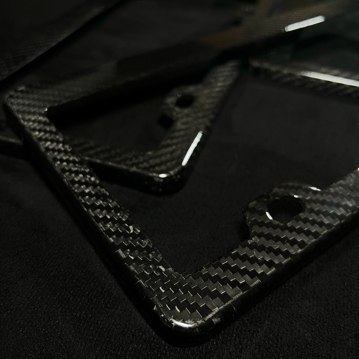 Carbon fiber license plate frame
